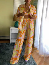 Pantalones con bolsillos elásticos y cintura holgada con estampado clásico